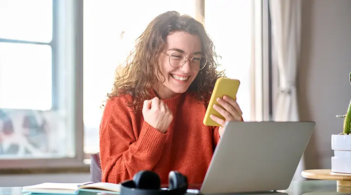 A woman gets approved for an online payday loan